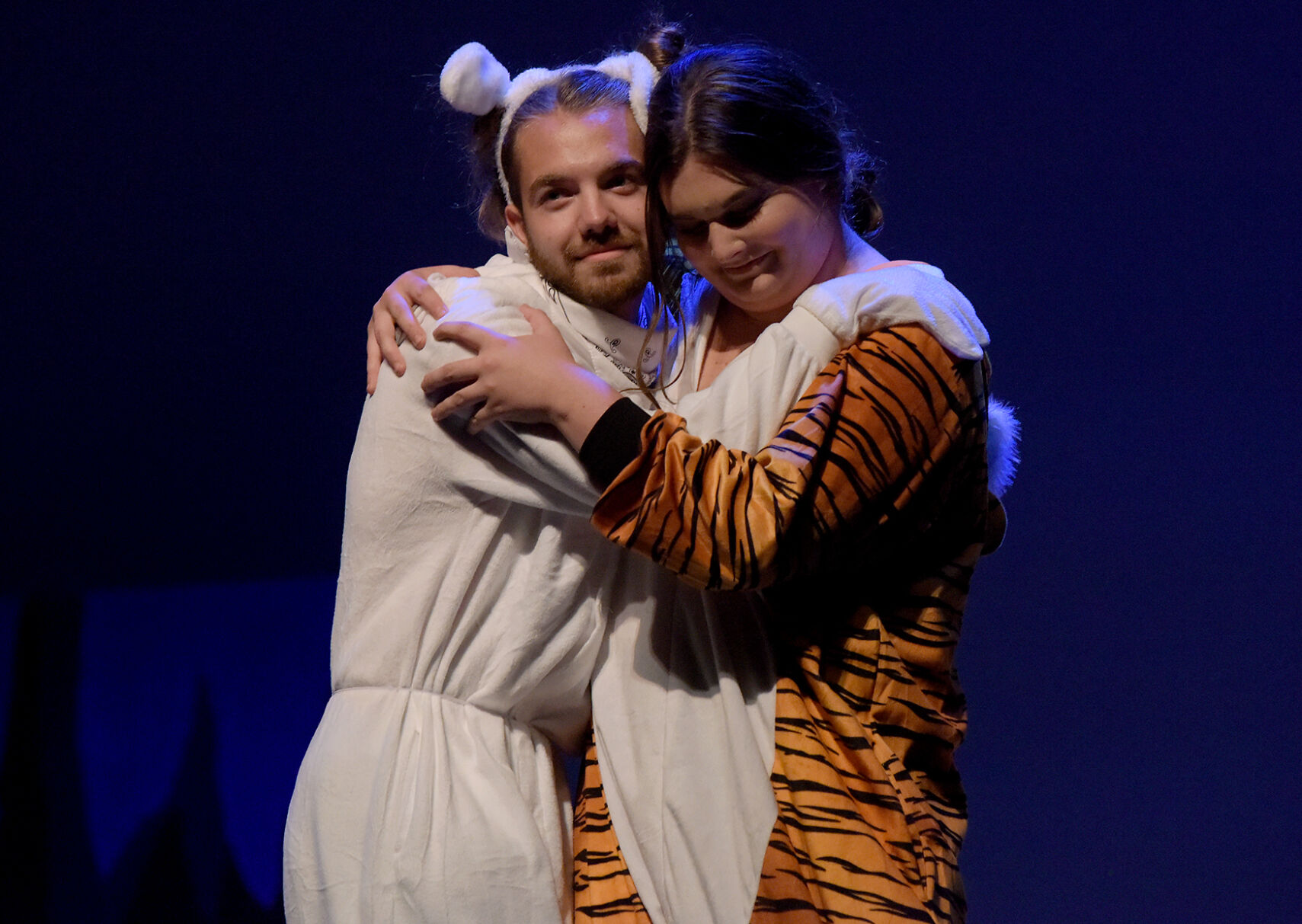Joe Roberts, left, embraces Kathryn Merck as she performs as Truman (copy)